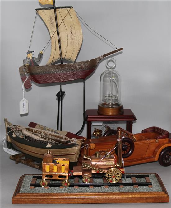 A model Stephensons Rocket, painted metal ship balance toy, a wooden boat & car & two glass ships (6)